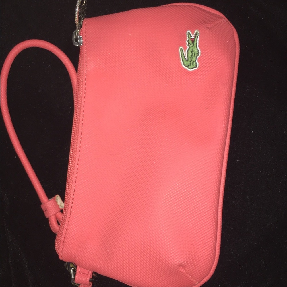 Pink Lacoste wristlet